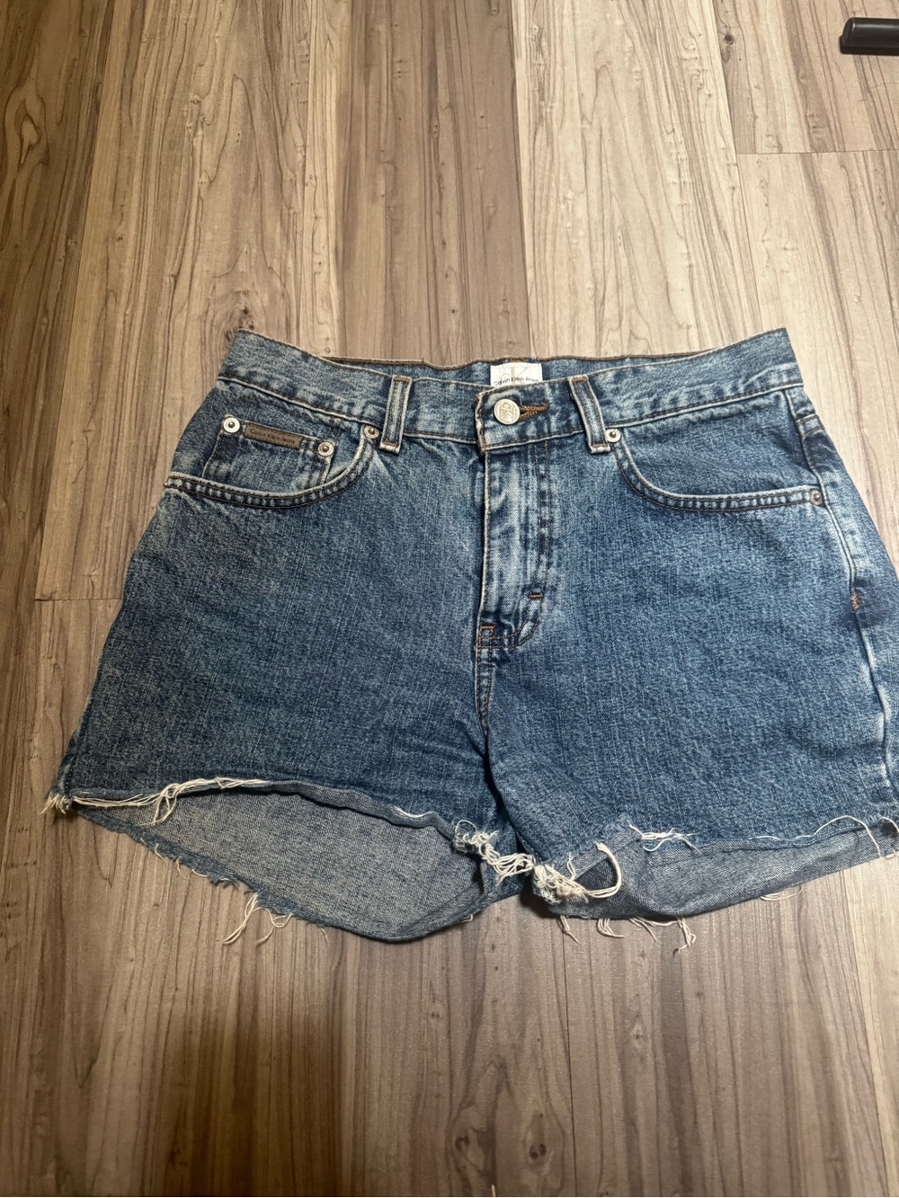 #1- Vintage Calvin Klein
Cutoff Denim Shorts -
Size 2
